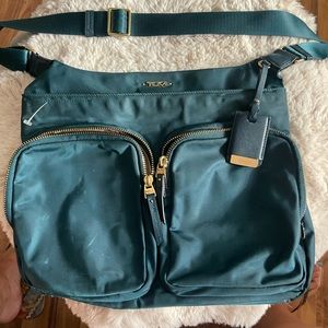 Hunter green Tumi crossbody adjustable